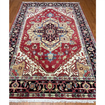 Indo Hand-knotted Heriz Wool Rug (6'1 x 9'3)
